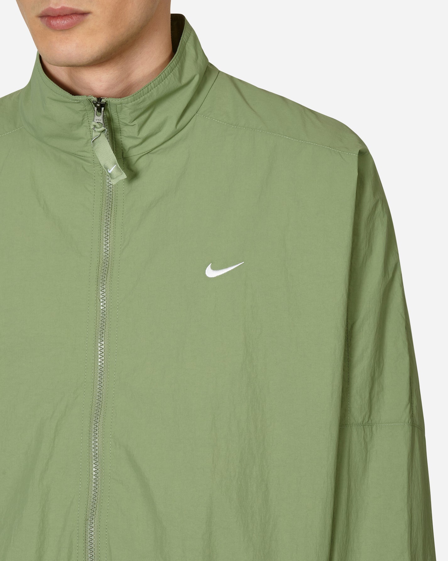 Nike Solo Swsh Wvn Trk Jkt Oil Green/White Coats and Jackets Jackets DQ5200-386