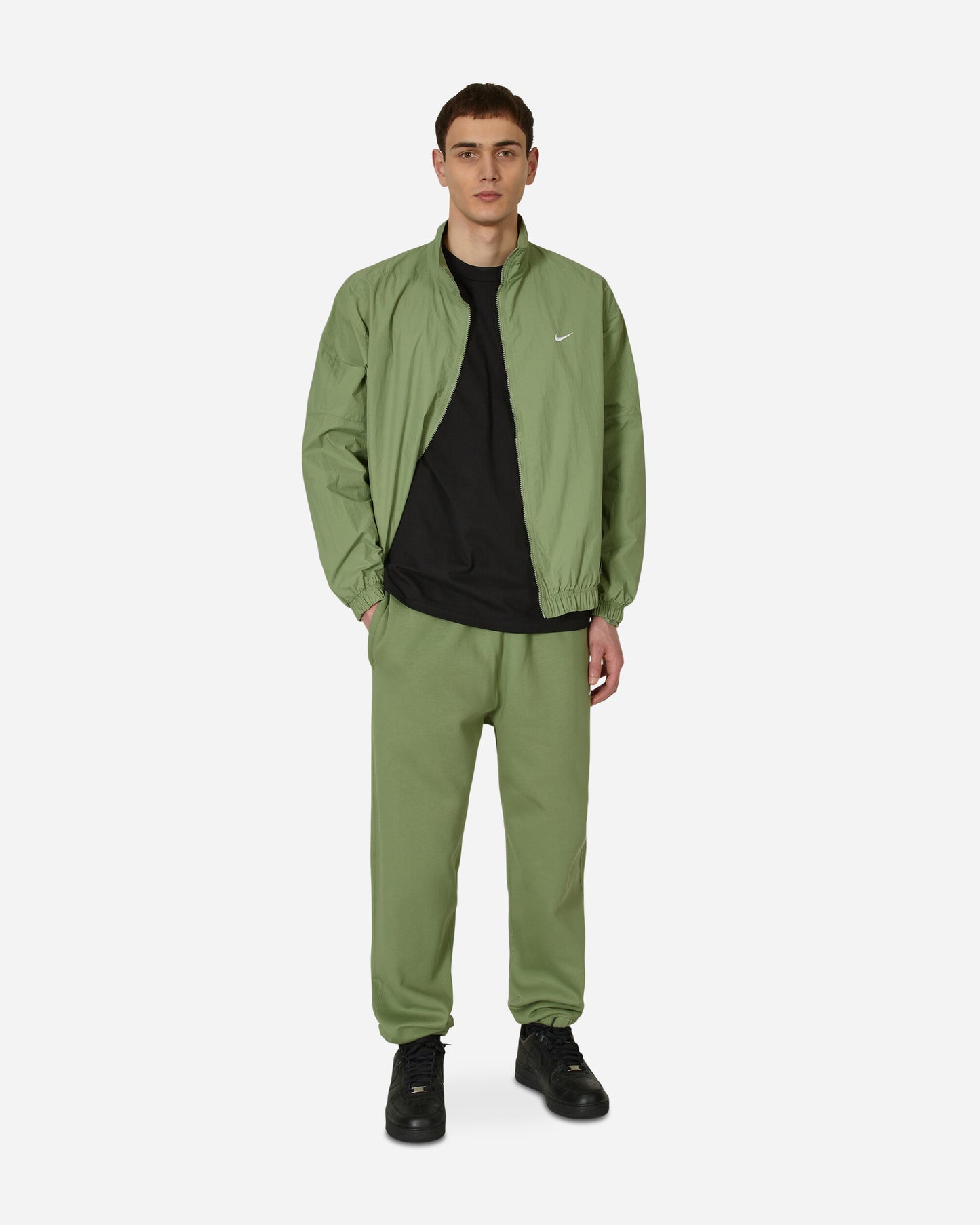 Nike Solo Swsh Wvn Trk Jkt Oil Green/White Coats and Jackets Jackets DQ5200-386