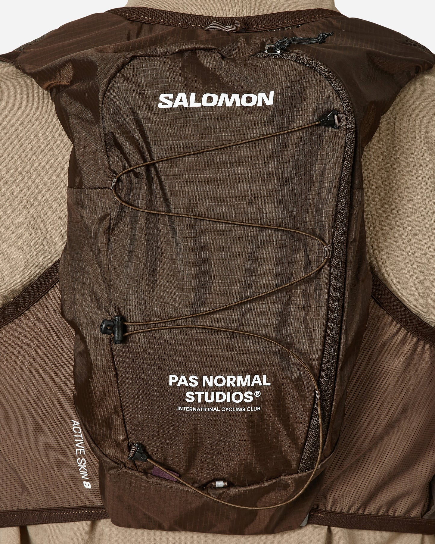 Salomon Active Skin 8 Pas Normal Studios Balck Coffee/Delicioso Coats and Jackets Vests LC2089000