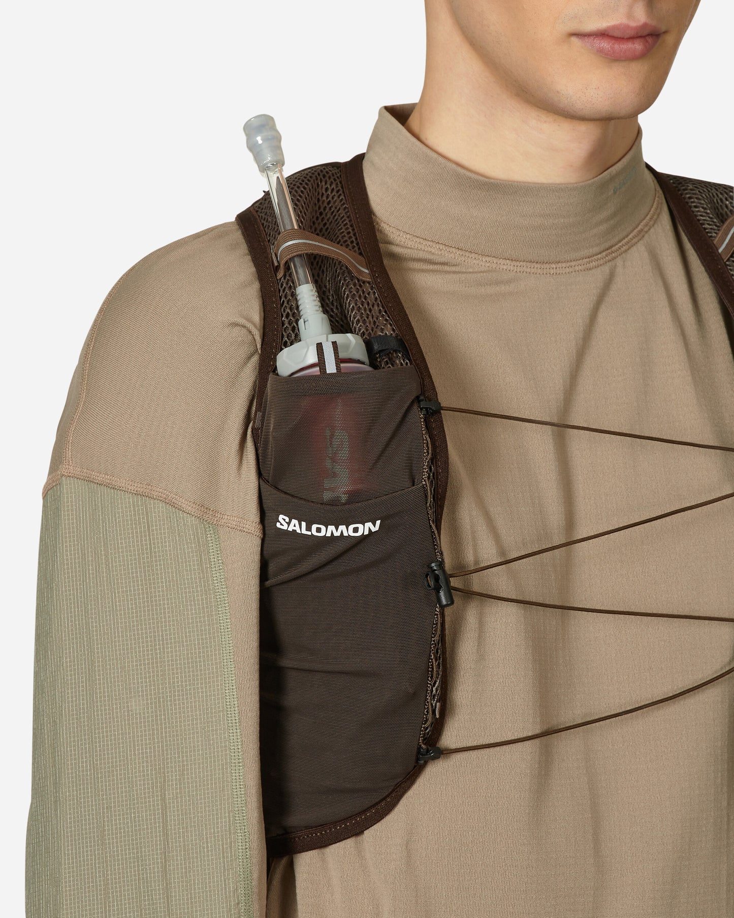 Salomon Active Skin 8 Pas Normal Studios Balck Coffee/Delicioso Coats and Jackets Vests LC2089000